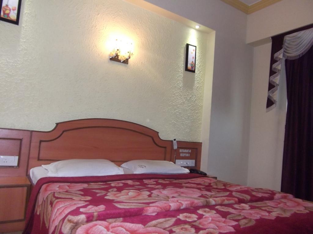 Hotel Ravikant Púna Szoba fotó
